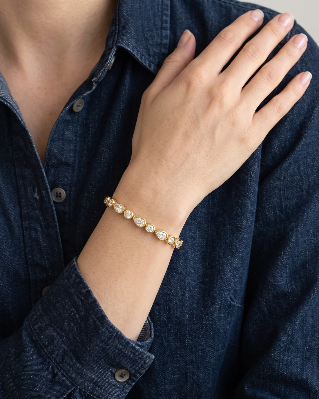 ORTIGAS Pear Bezel Line bracelet, worn on the wrist