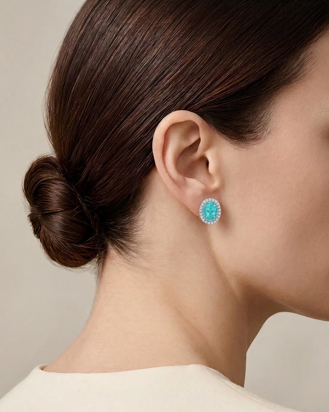 ORTIGAS Paraiba Halo Studs earrings, worn on the ear