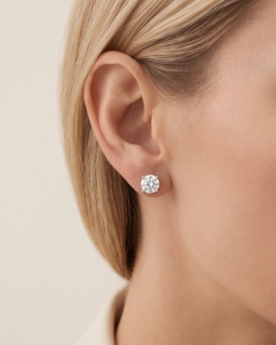 ORTIGAS Round Studs earrings, worn on the ear
