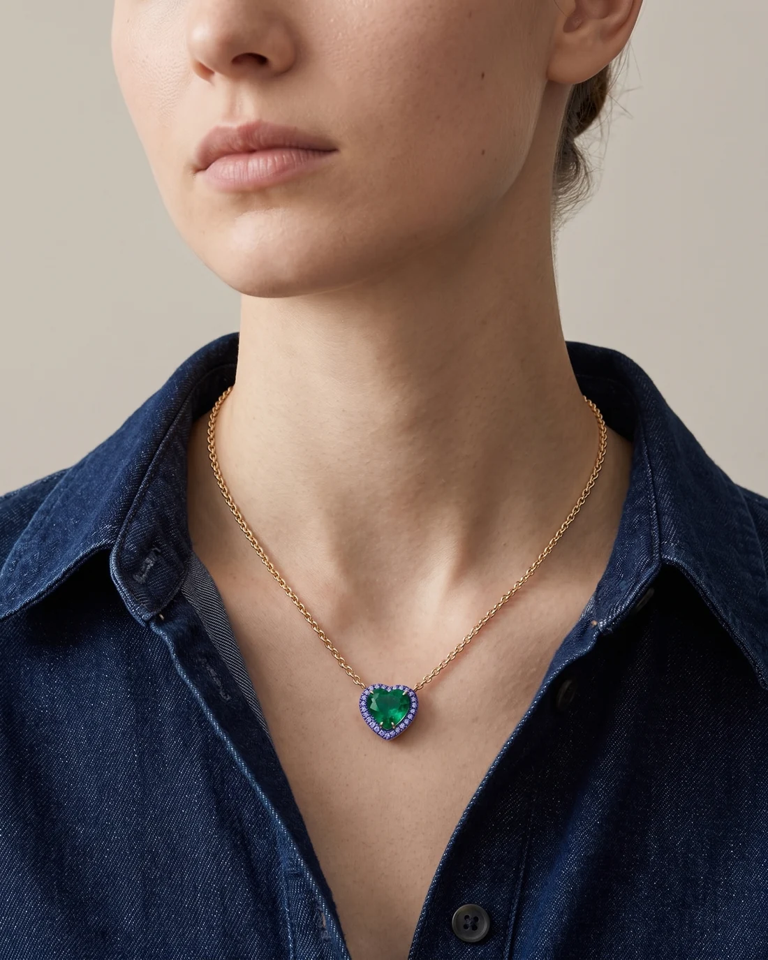 ORTIGAS Emerald Heart necklace, worn on the neck