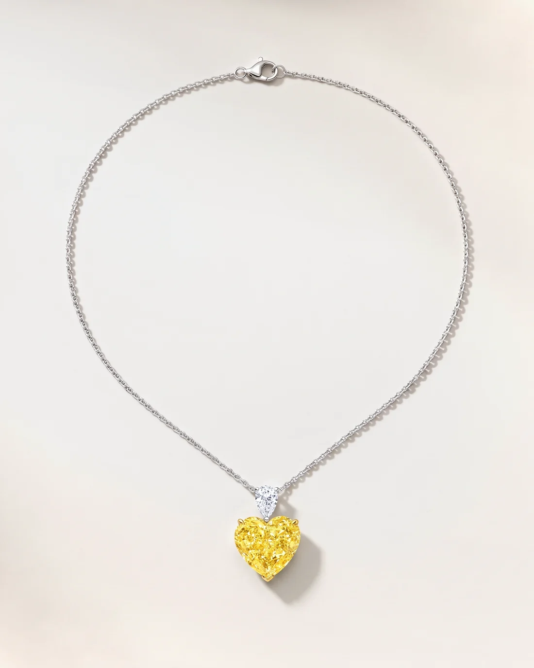 ORTIGAS Yellow Heart Drop necklace, front view