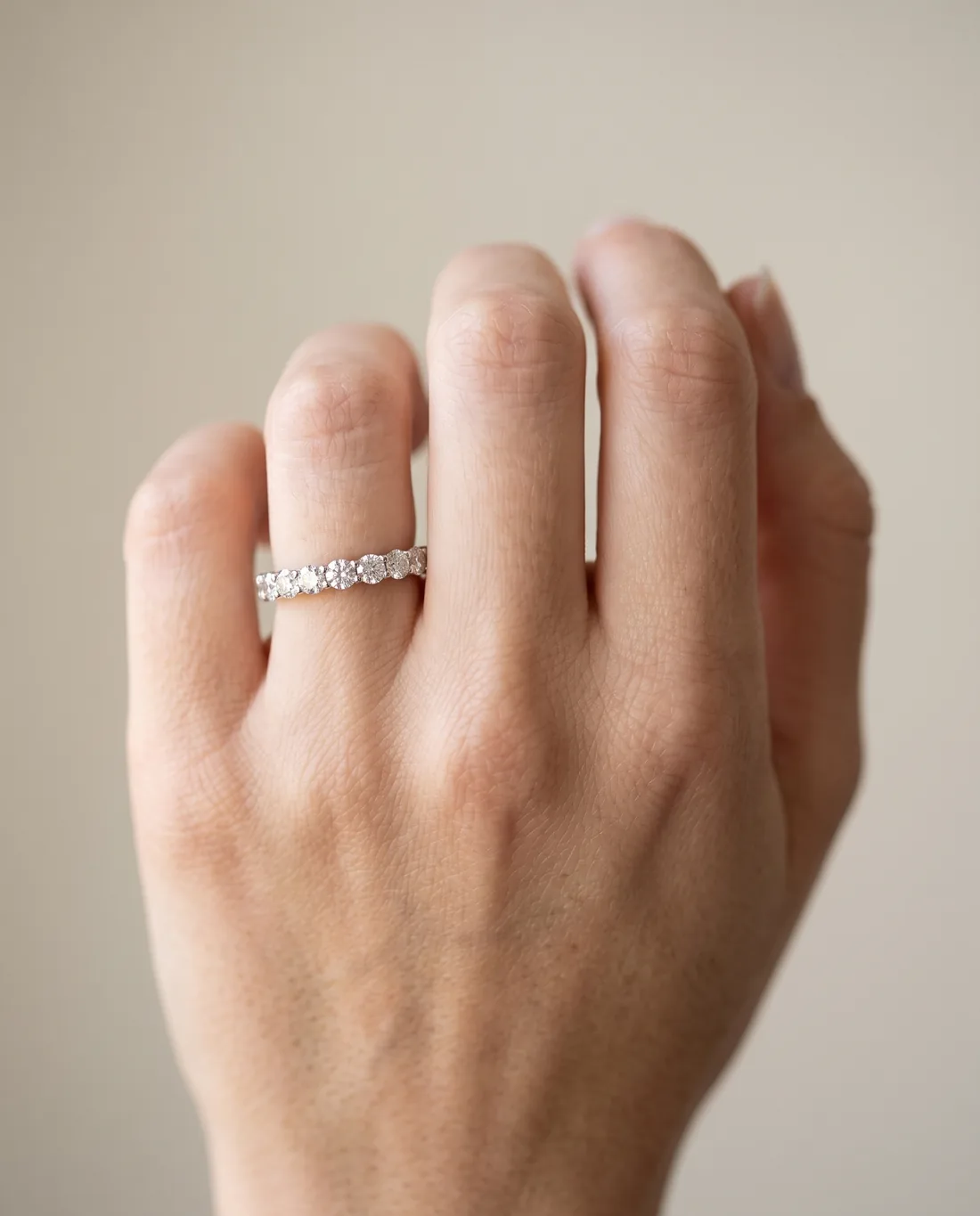 ORTIGAS Diamond eternity band worn on the hand