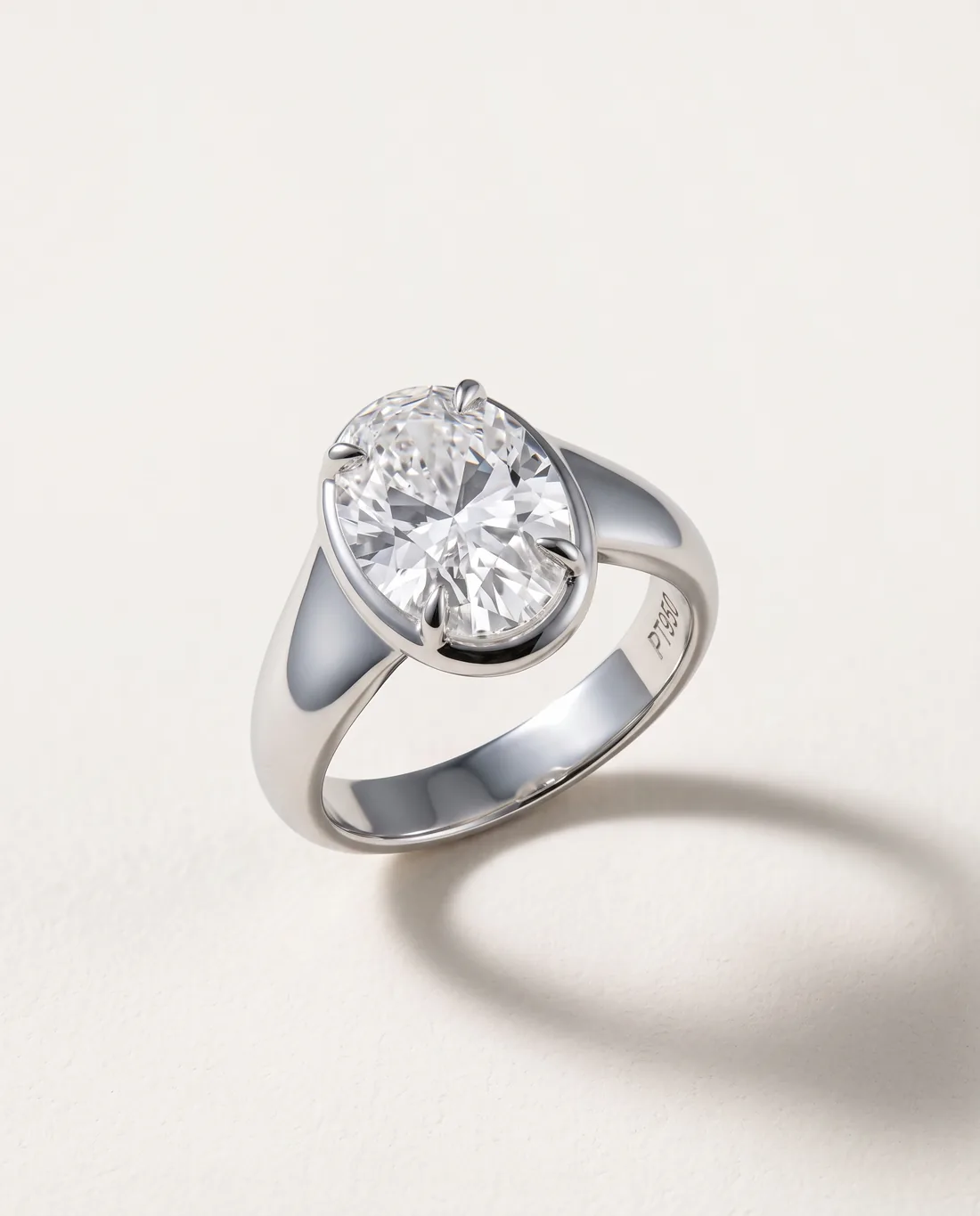 ORTIGAS Oval bezel ring, three-quarter view