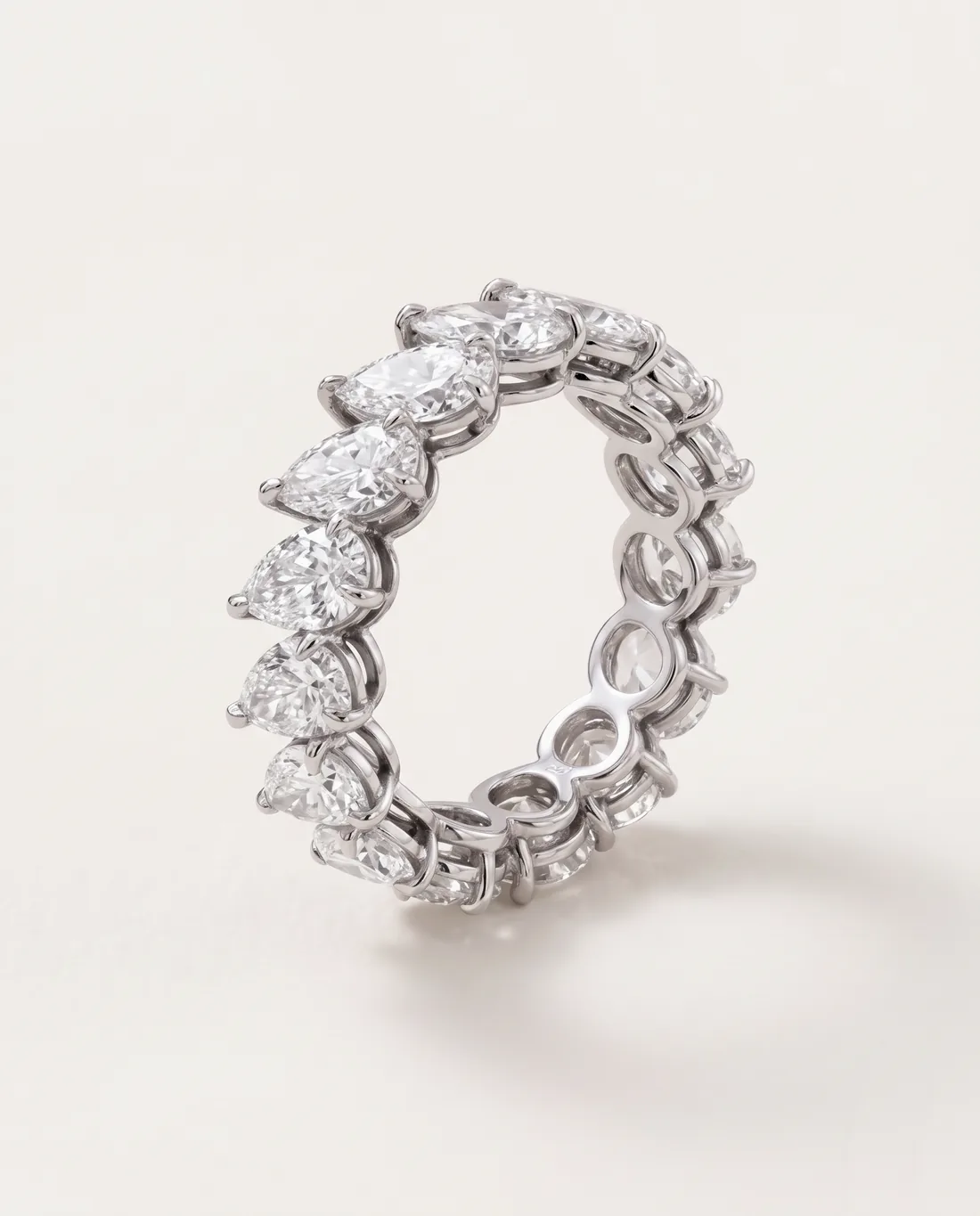 ORTIGAS Pear Eternity ring, three-quarter view