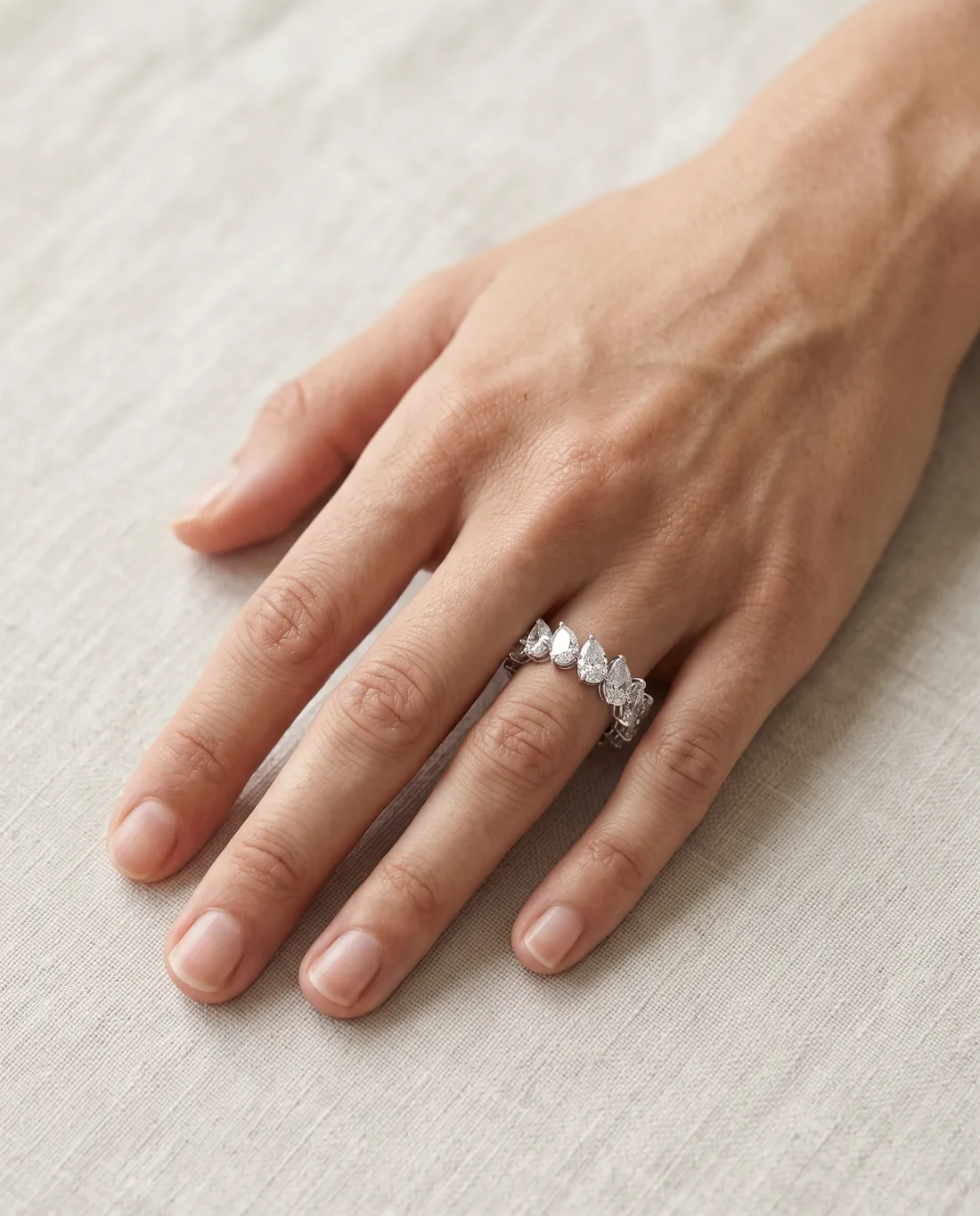 ORTIGAS Pear Eternity ring, worn on the hand