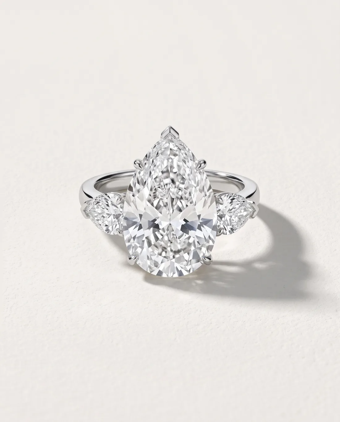 ORTIGAS Pear three-stone ring, front view