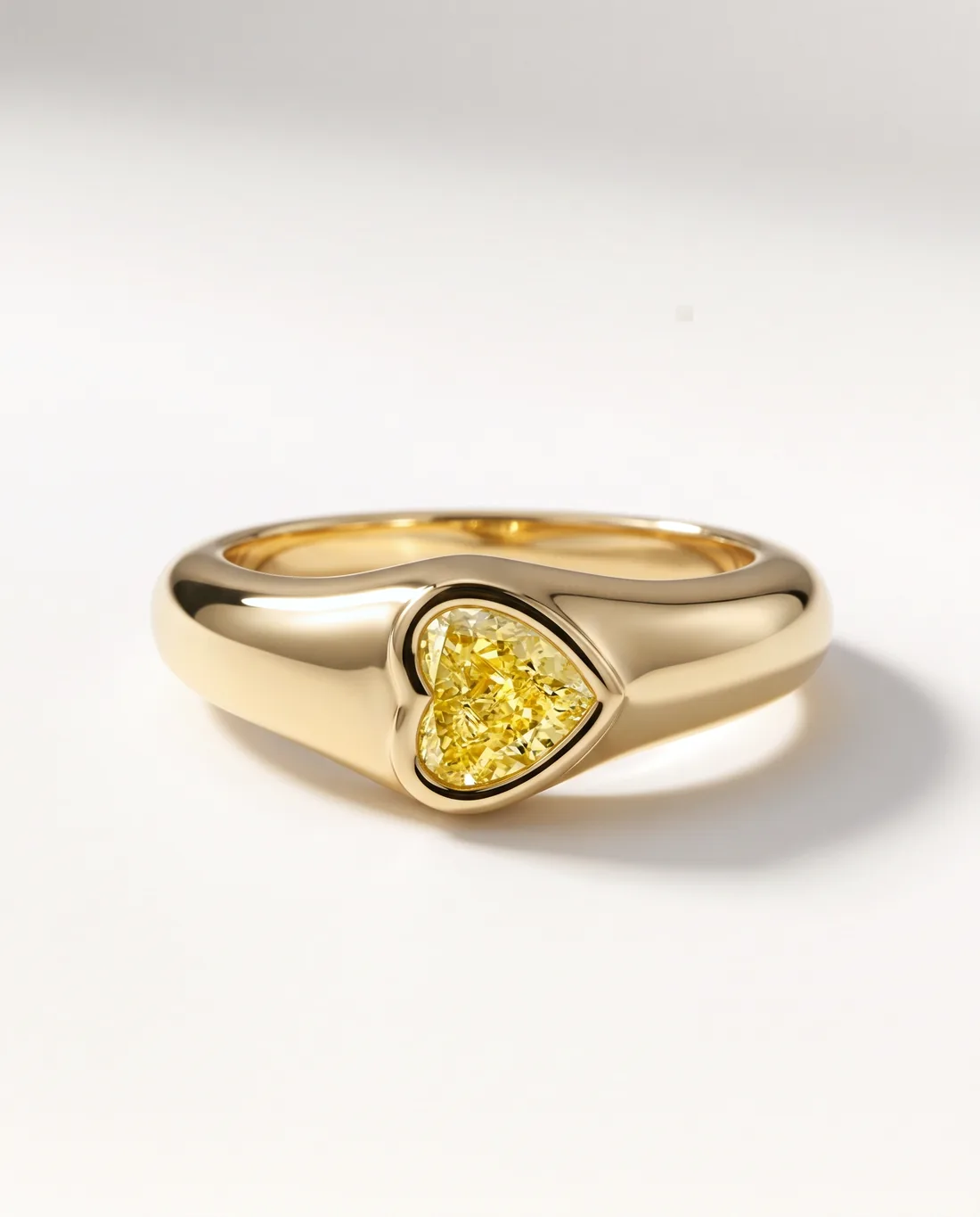ORTIGAS Yellow Heart Signet ring, front view