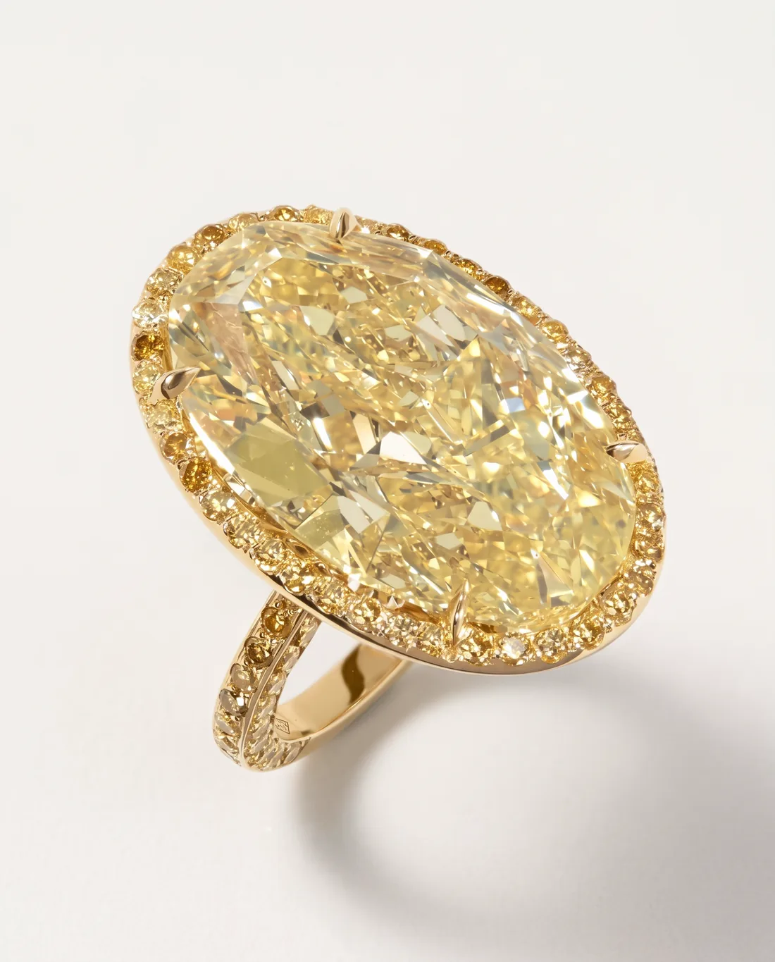 ORTIGAS Yellow Oval Halo ring, front view