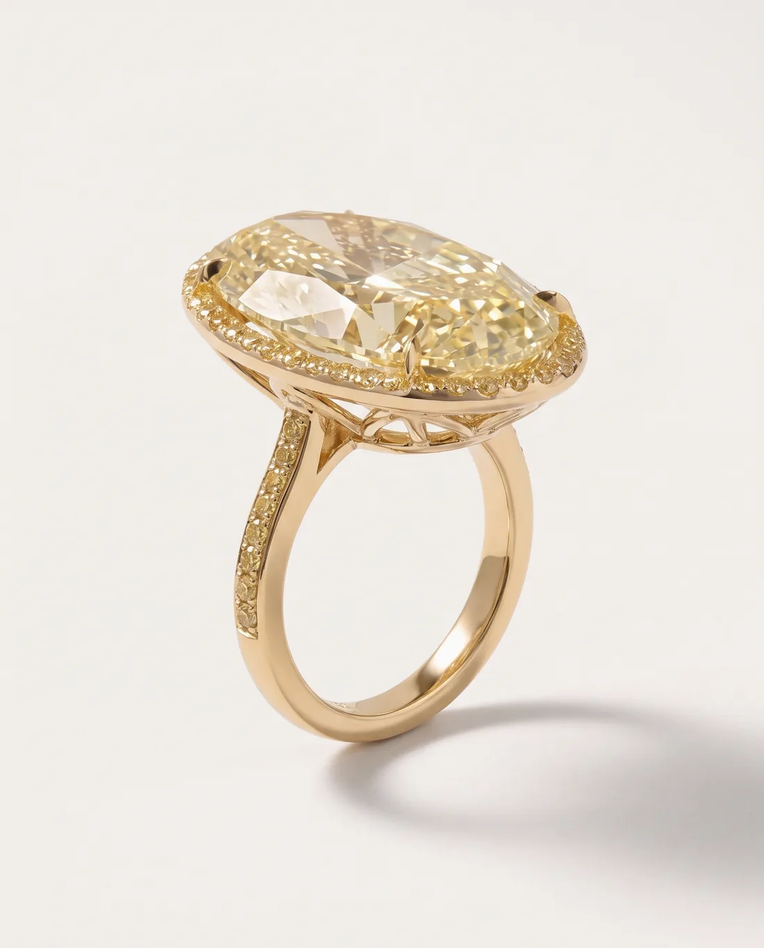 ORTIGAS Yellow Oval Halo ring, three-quarter view