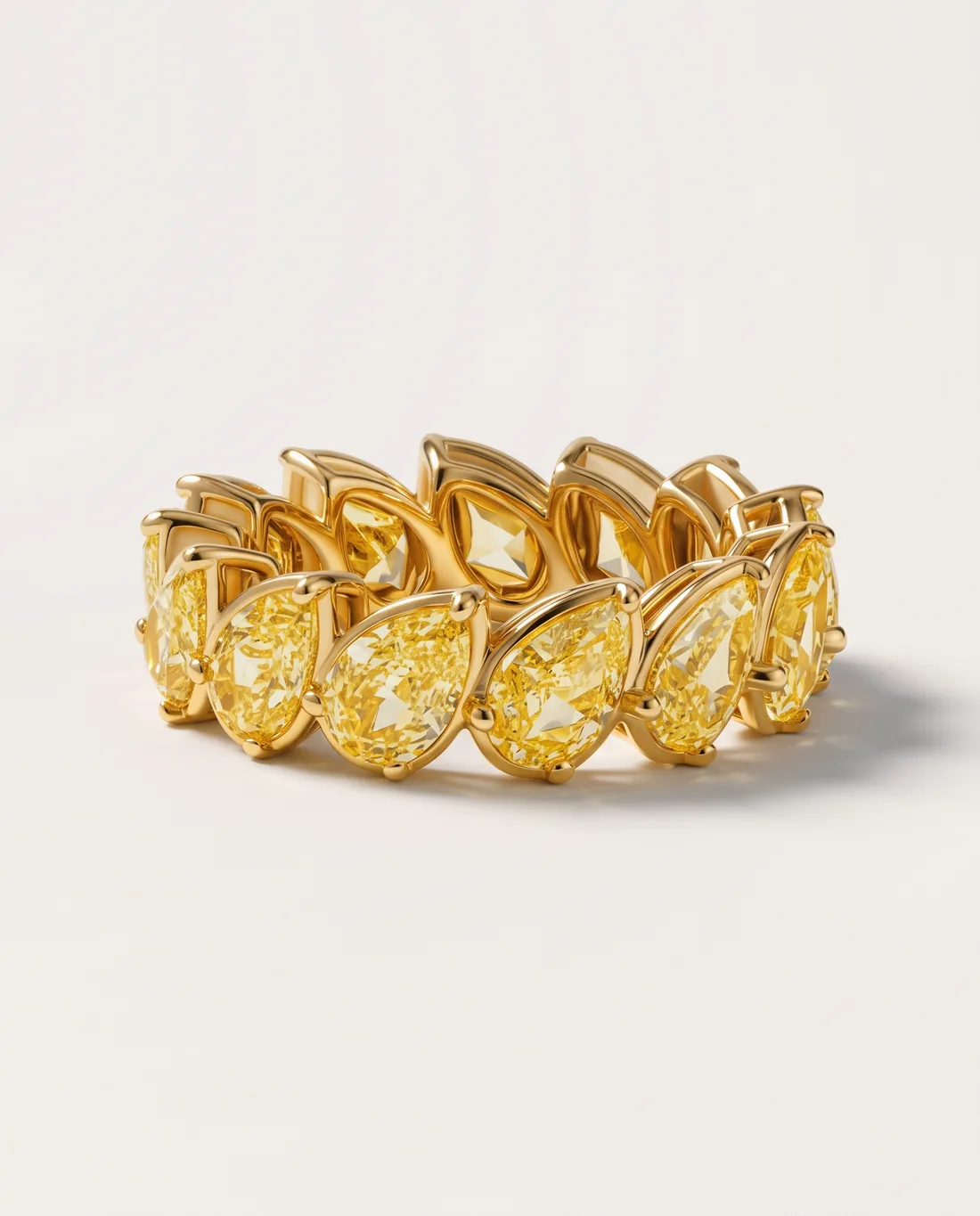ORTIGAS Yellow Pear Eternity ring, front view