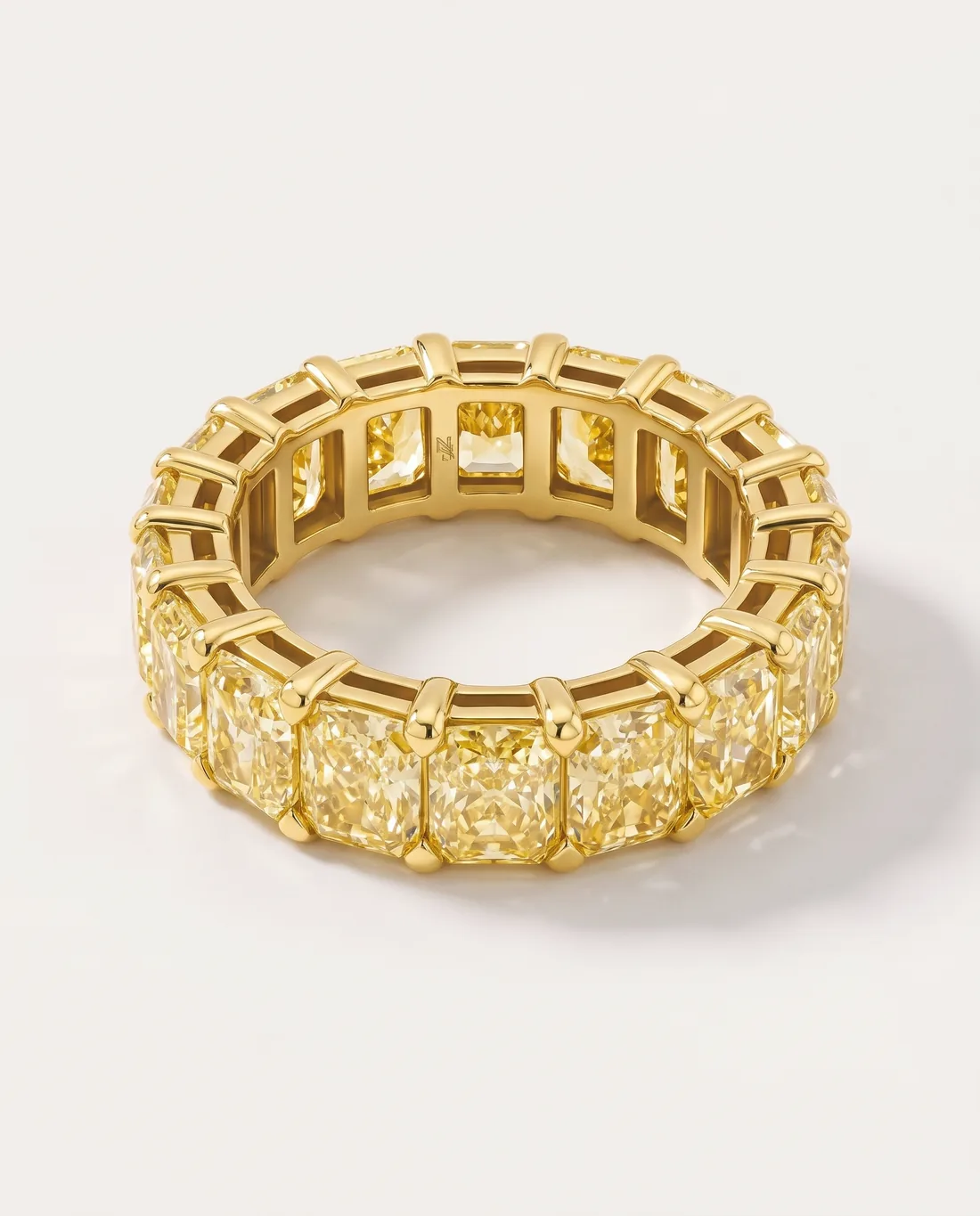 ORTIGAS Yellow Radiant Eternity ring, three-quarter view